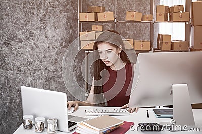 Calculating the cost of postage of a small package, Stock Photo