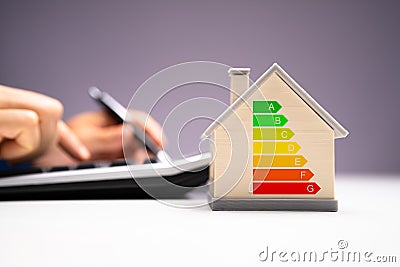 Calculating Energy Efficient House Consumption Stock Photo