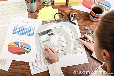 Calculating on the office desk Stock Photo