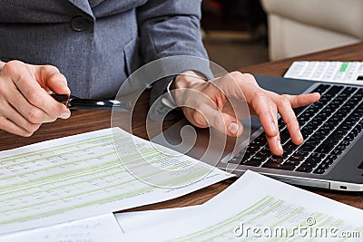 Calculating on the office desk Stock Photo
