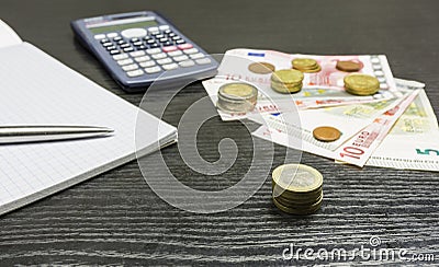 Calculation of income in euro currency. Stock Photo