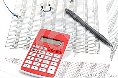 Calculator and ballpoint and glasses and Accounting documents Stock Photo