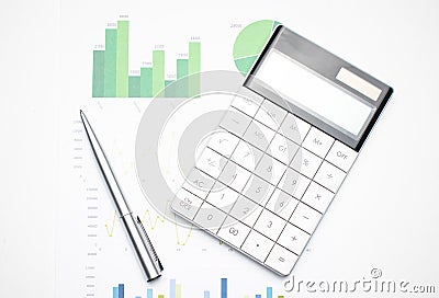 Calculator on financial statement and balance sheeet on desk of auditor. Concept of accounting and audit business Stock Photo