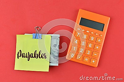 Calculator, money banknote and memo note written with PAYABLES Stock Photo