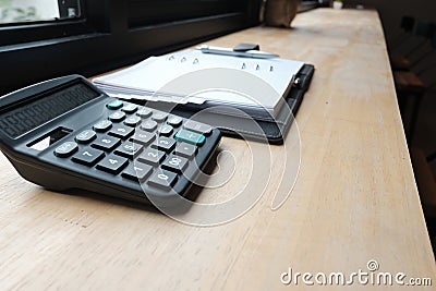 calculator & notebook on accountant desk. bookeeper, financial i Stock Photo