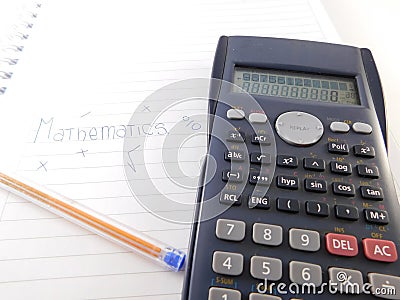 Calculator, pen and sheets. Stock Photo