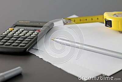 Calculator pencil and meter tape Stock Photo