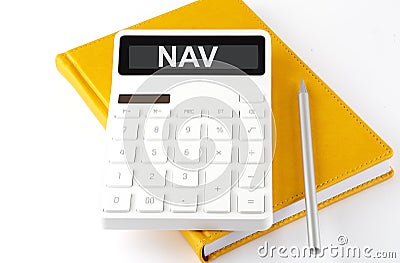 Calculator with the text NAV Net Asset Value on display on the notebook Stock Photo