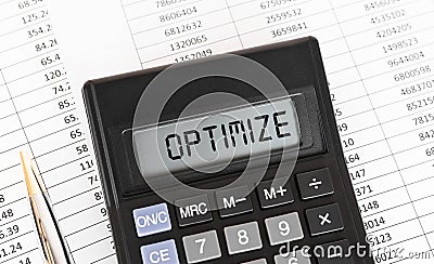 Calculator with the word OPTIMIZE on the display Stock Photo