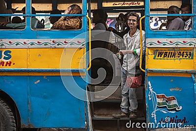 Colorful buses are commonly used in Calcutta for public transport Editorial Stock Photo