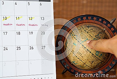 Calendar with antique globe Stock Photo