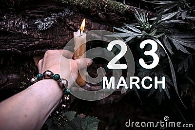 calendar date on the background of an esoteric spiritual ritual. March 23 is the twenty-third day of the month Stock Photo