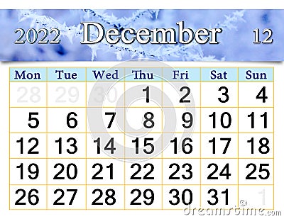 calendar for December 2022 with picture of tree branch covered with frost Stock Photo