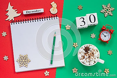 calendar December 30th cup cocoa and marshmallow, empty open notepad Stock Photo