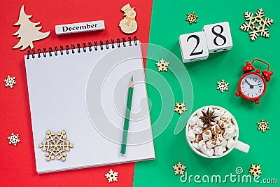 calendar December 28th cup cocoa and marshmallow, empty open notepad Stock Photo