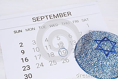 Calendar with kippah. Yom kippur Stock Photo