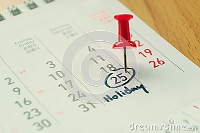 Calendar and marked date on Holiday vintage tone Stock Photo