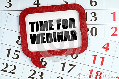 On the calendar, a red plaque with the words inside - TIME FOR WEBINAR Stock Photo