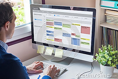 Calendar software showing busy schedule of manager with many meetings, tasks and appointments during the week, time management Stock Photo