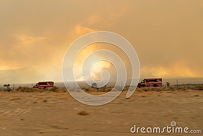 CalFire fire trucks rush to the scene of a threatening wildfire Editorial Stock Photo