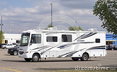 A Coachmen Mirada Bunk Bed RV Camper trailer in a parking lot Editorial Stock Photo