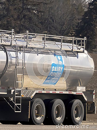 A close up to a truck with a sign text: Dairy farmers of Canada quality milk Editorial Stock Photo