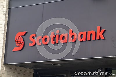 A Scotiabank sign on a location branch. The Bank of Nova Scotia, operating as Scotiabank Editorial Stock Photo