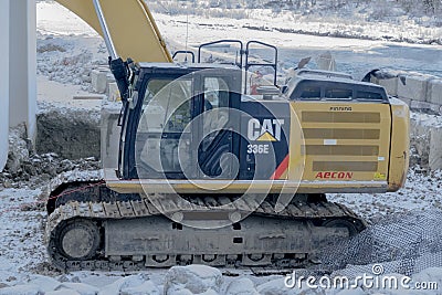 A close up to a Hydraulic Excavator Operator Station during the winter Editorial Stock Photo