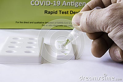 Action shot of a Covid 19 Rapid Test being performed Editorial Stock Photo