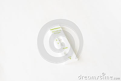 A negative rapid Covid 19 test on a white background. Editorial Stock Photo