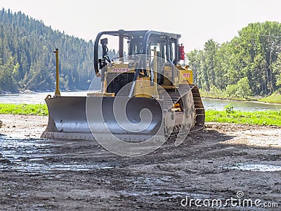 A Slope Assist for Dozers or heavy duty earthmover Concept: Construction equipment Editorial Stock Photo