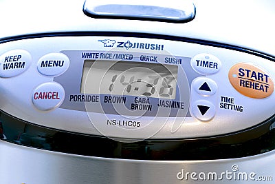 A close up to a Zojirushi 5.5 Cup Microcomputer Rice Cooker and Warmer menu Editorial Stock Photo