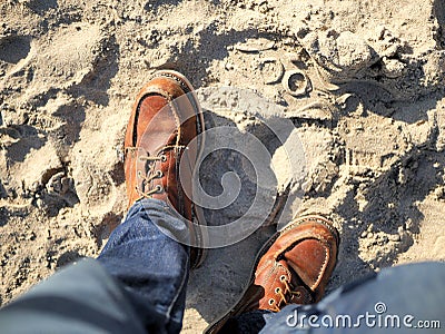 California beach shot of my boots in the sand. For travel blogs as a banner image, graphic, social media post with copy space. Stock Photo