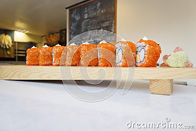 california roll on wooden plate for pattern Stock Photo