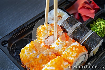 California rolls with chopsticks with sushi set Stock Photo