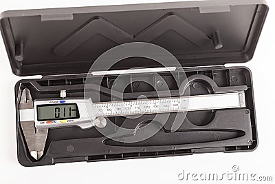 caliper. a device for measuring precision. the size of a part, as well as the diameter. close-up. Stock Photo