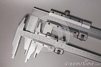 Caliper is a highly accurate measurement tool. The exact size of the parts. Professional tool Stock Photo