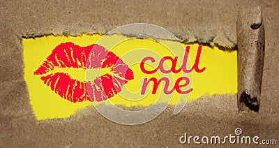 Call me text and a kiss under torn brown paper. Love date Romance concept Stock Photo