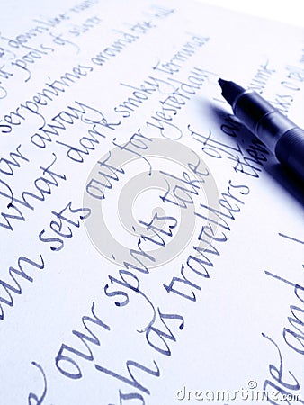 Calligraphic pen and handwriting on paper Stock Photo