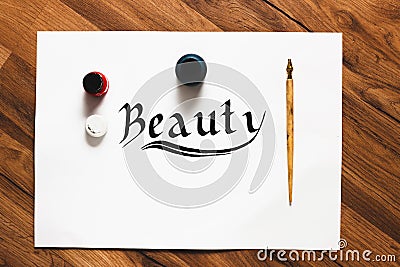 Calligraphy Beauty word background Stock Photo