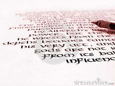 Calligraphy pen and handwriting on paper Stock Photo