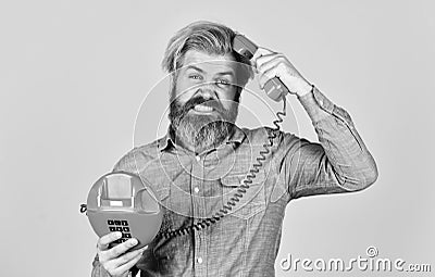 Calling on Past Customers Script. Outdated technology. Manager phone communication. Answering machine. Bearded hipster Stock Photo