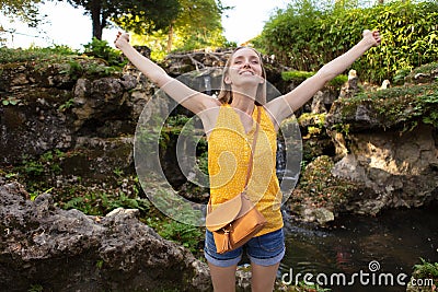 calm beautiful smiling young woman with enjoying fresh air outdoors Stock Photo