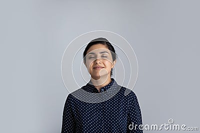 Calm Indian woman breathe fresh ventilated air Stock Photo