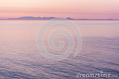 Calm sea before the dawn. Natural water surface. Seascape soft background. Aerial view sunrise ocean with sky. Purple Stock Photo