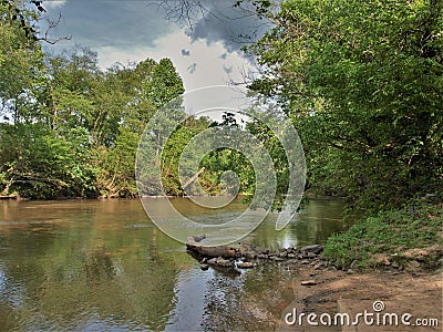 Storm Clouds over the Dan River in North Carolina Stock Photo