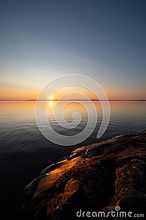 Calm serene sunrise lake scenery Stock Photo