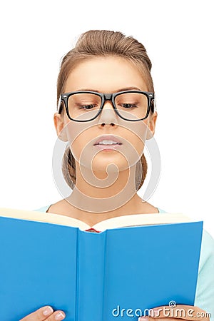 Calm and serious woman with book Stock Photo