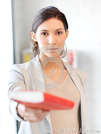 Calm and serious woman with book Stock Photo
