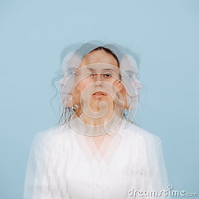 Calm woman. Triple exposure portrait. She`s facing three different directions Stock Photo
